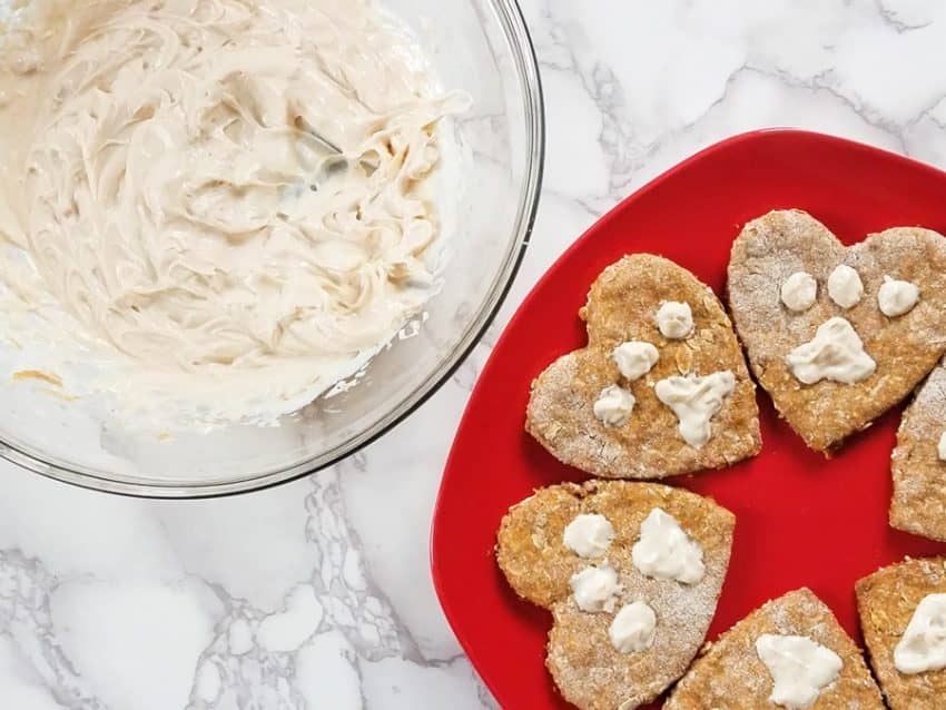 Celebrate Love Your Pet Day everyday with these adorable & tasty homemade heart-shaped dog biscuits! Grab the recipe now! 